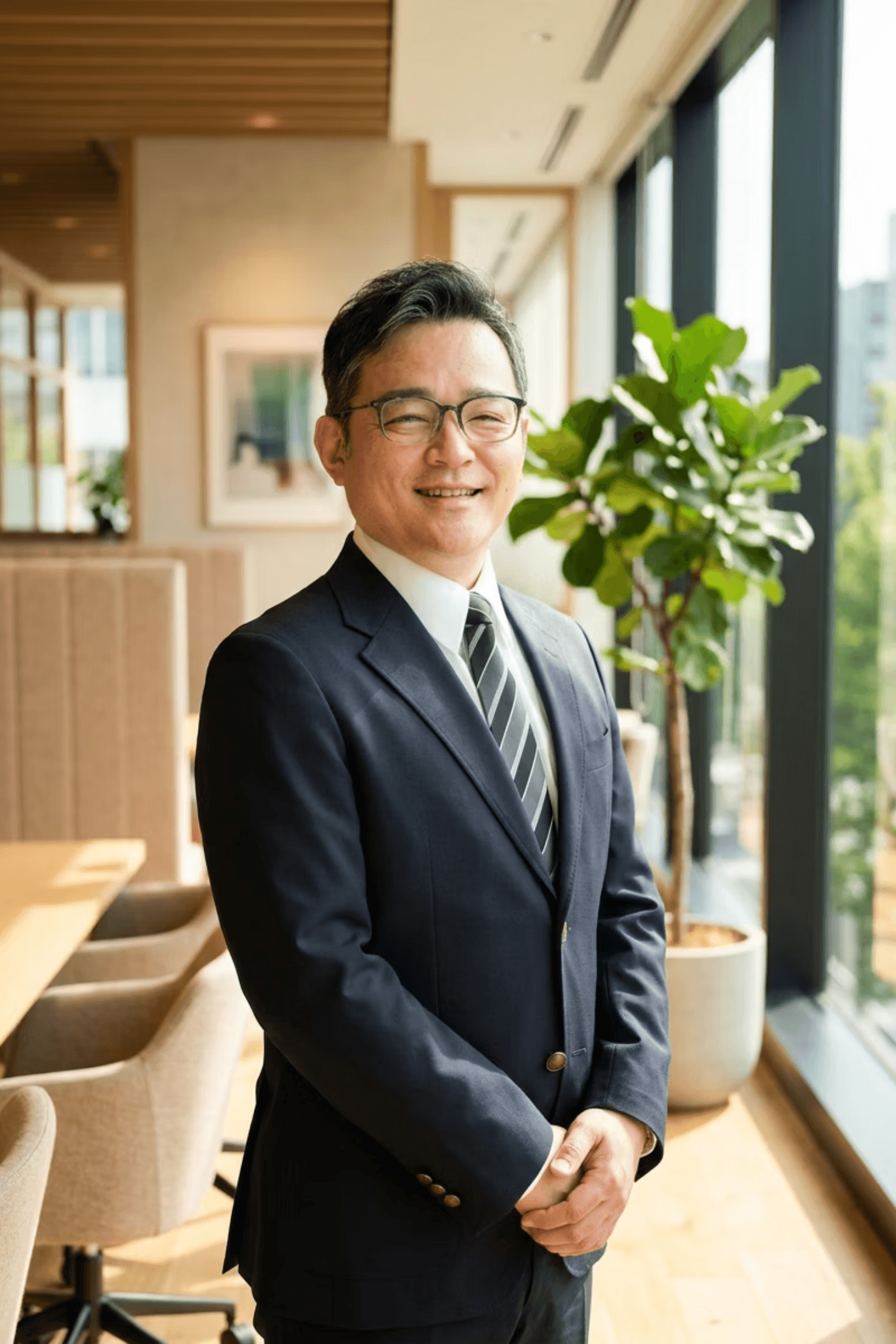 講師 岡崎達也
